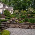 paver patio with landscaping and hardscaping