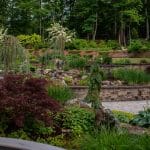 paver patio with landscaping and hardscaping