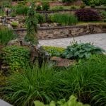 paver patio with landscaping and hardscaping