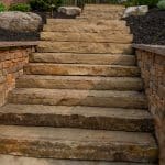 blackhills stone natural stairs with retaining wall and landscaping