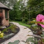 Front walk way with pavers and paver design and landscaping