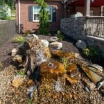 water feature in landscaping on outdoor living space