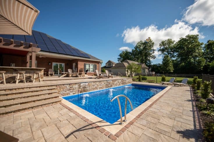 Resort like Outdoor Living Space with Fiberglass Pool, Hot tub, and Outdoor Kitchen in Duncansville, PA