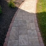 paver sidewalk with landscaping