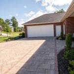 paver drive way and landscaping at front of home
