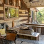 outdoor kitchen with granite counters and stainless steel appliances