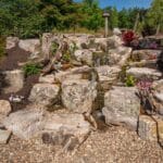 water feature with water falls and mountain boulders