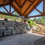 rosetta retaining wall with pavilion and natural stone stairs with landscaping