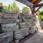 rosetta retaining wall with pavilion and natural stone stairs with landscaping
