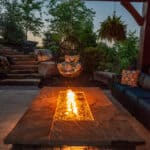 fire pit with led lighting and outdoor living space