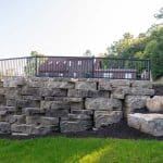 large retaining wall with landscaping
