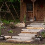 natural stone stairs with landscaping