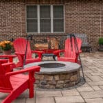 paver patio with fire pit and outdoor living space