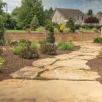 mulch planting bed with flagstone walk way