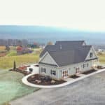 pondless water fall with landscaping and edging hyrdroseed grass