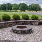 paver patio with seating wall and fire pit
