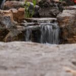 mountain boulders and waterfall