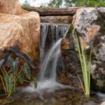 mountain boulders and waterfall