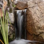 mountain boulders and waterfall