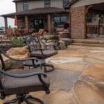 waterfall with koi pond, mountain , boulders, flagstone patio and landscaping