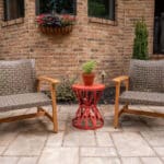 paver walk way with mulch planting beds and sidewalk