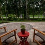 paver walk way with mulch planting beds and sidewalk