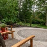 paver walk way with mulch planting beds and sidewalk