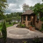 paver walk way with mulch planting beds and sidewalk