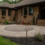 paver walk way with mulch planting beds and sidewalk