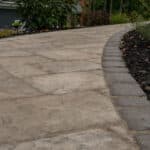paver walk way with mulch planting beds