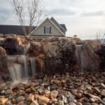 pondless water fall with landscaping and edging