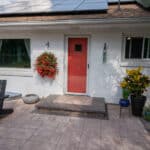 paver patio with landscaping with paver stoop