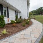paver side with landscaping and lighting
