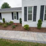 paver side with landscaping and lighting