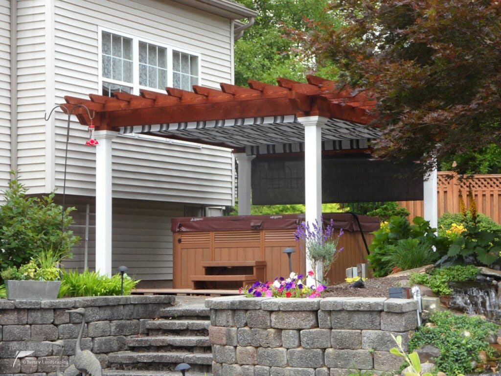 Wood and Vinyl Pergola – Retaining Wall