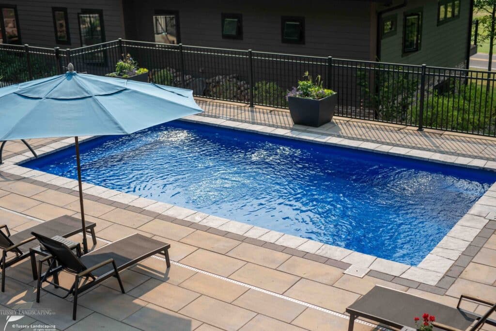 Outdoor living space with fiberglass swimming pool in Bedford PA