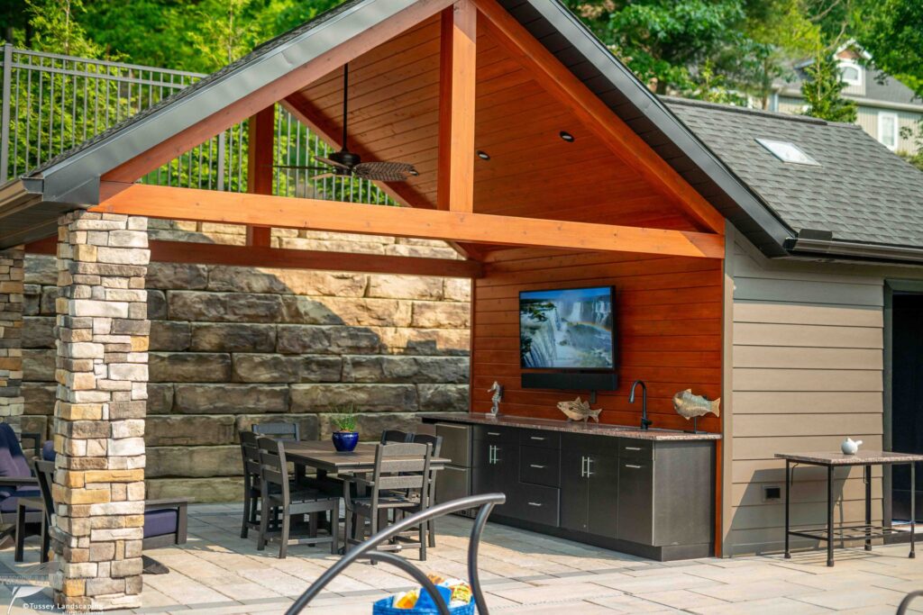 Outdoor living space in Bedford PA with Retaining Wall & Outdoor Kitchen