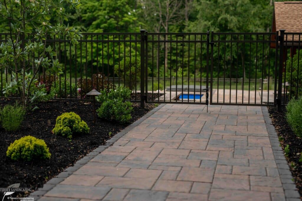 Landscaping with Fencing around Fiberglass Swimming Pool in Bedford, PA