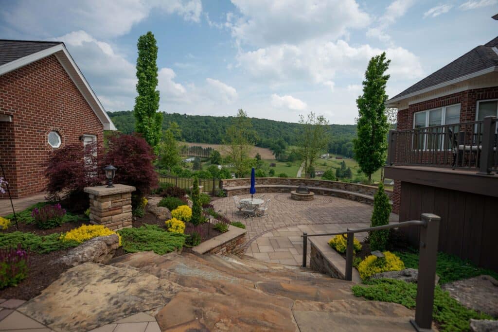 Paver patio with seating wall and firepit in Johnstown, PA