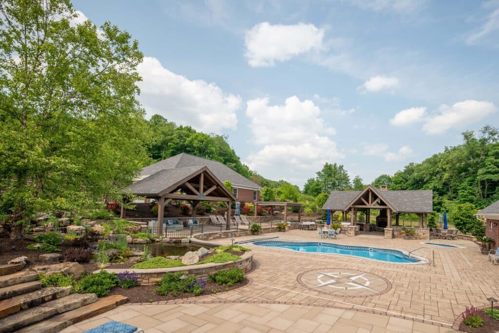 Outdoor living space with fiberglass swimming pool