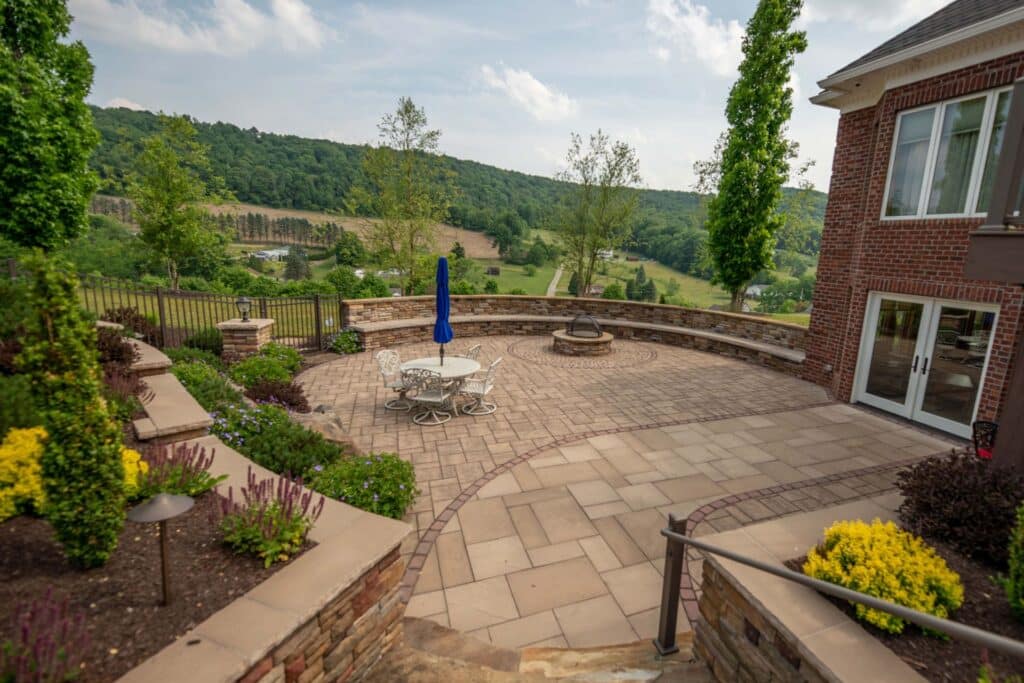 Paver patio with seating wall and firepit in Johnstown, PA