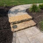 paver sidewalk with landscaping