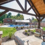 custom fireplace in pavilion on paver patio