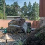 landscaping beds with and water feature
