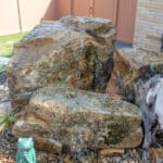 landscaping beds with and water feature