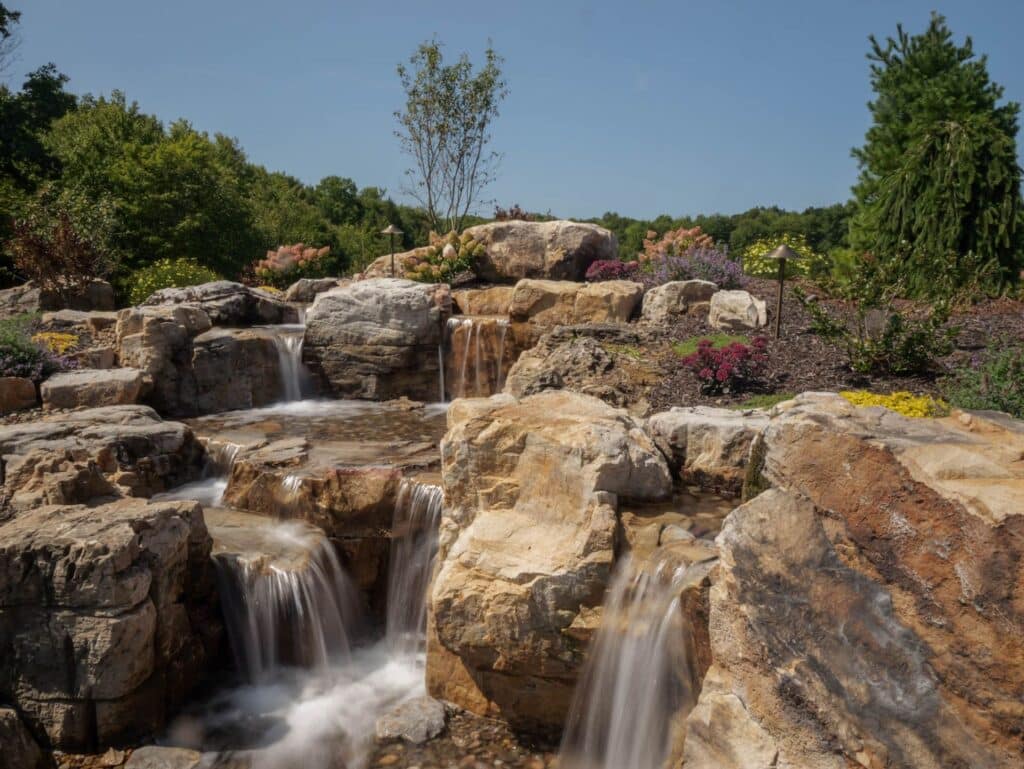 Waterfall with large sandstone boulders