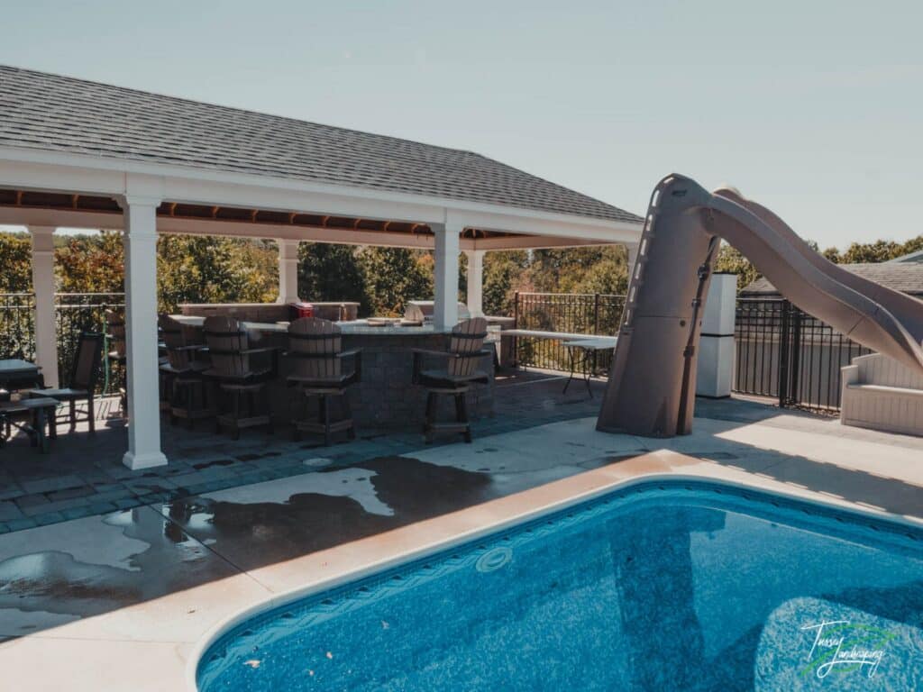 Swimming pool in backyard with paver patio - Bedford PA