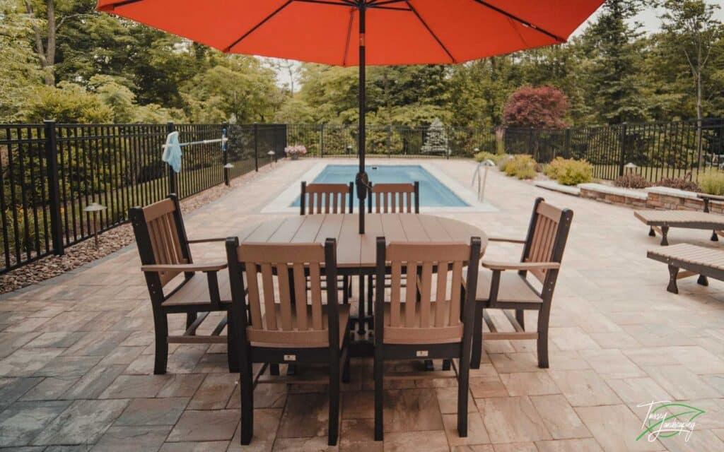 Swimming pool in backyard with paver patio - Bedford PA