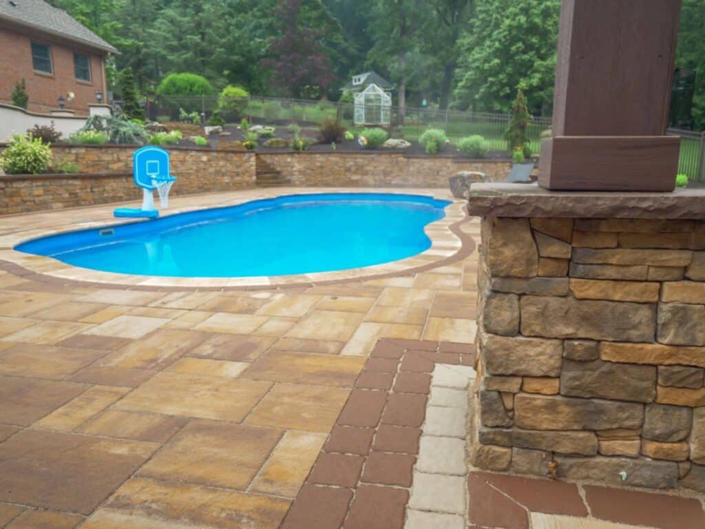 swimming pool with EP Henry patio in Hollidaysburg PA