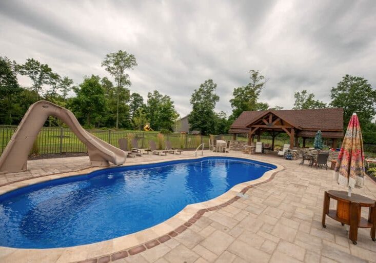 fiberglass swimming pool with patio